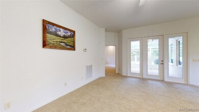 Looking across flex space (use as family room or d