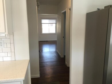 KITCHEN LEADING INTO HALLWAY