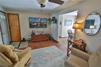 View of living room w coat closet