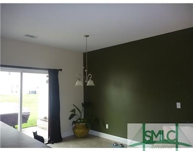 Dining Room. DINING AREA WITH VIEW OF BACKYARD