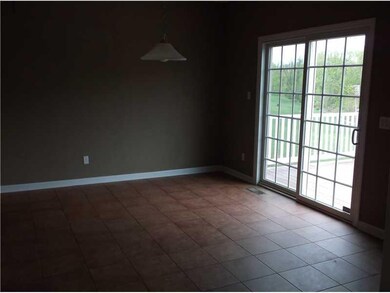 Kitchen. Eat-in kitchen area with patio door to re