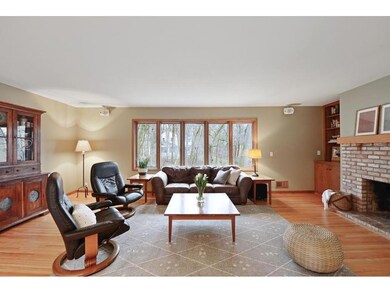 Large windows bring in natural light and overlook 