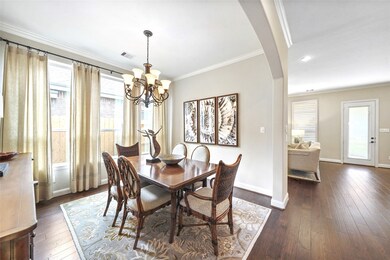 Luxury mocha wood flooring throughout