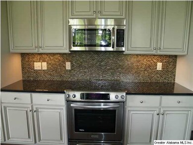 Granite countertops and stainless steel KitchenAid