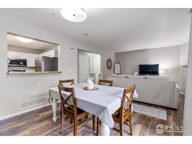 Custom Wood Pass-through into the kitchen keeps flow open