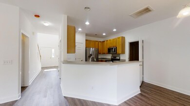 420 Kitchen view of front entry and door