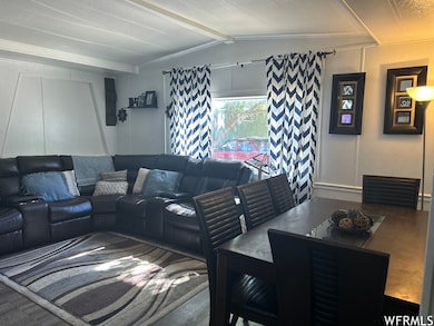 Living room with vaulted ceiling