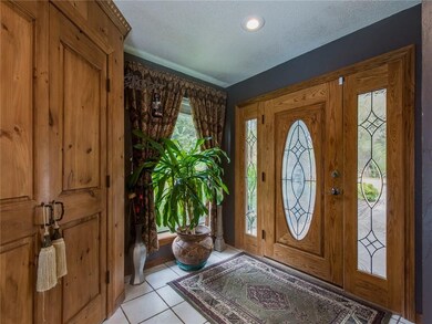 Front door entry, large and has a closet.