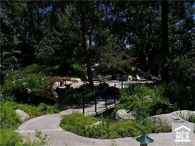 Babbling Brooks and tree lined walkway leads to th