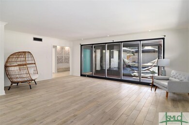 Livingroom looking into the breezeway and courtyar