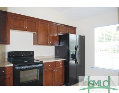 Kitchen. PHOTOS ARE FROM SIMILAR TOWNHOMES BY THE 