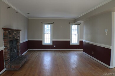 Open, Expansive living room with hardwood floors,c