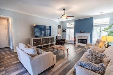 spacious living area with 12 foot ceilings