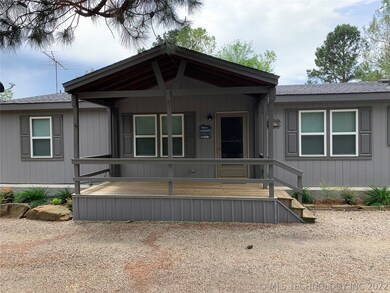 Front porch & concrete retaining wall on front and