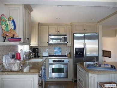 Kitchen has Stainless-steel Appliances