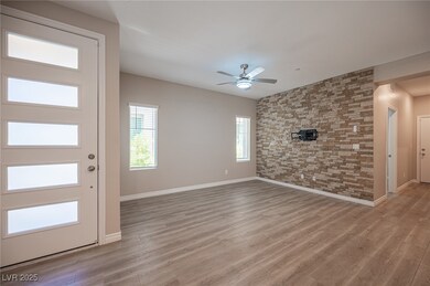 Foyer entrance featuring light wood-style floors a