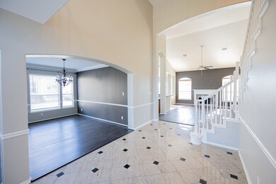 You'll find arched doorways and windows throughout the home.