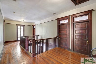 Units C and D are upstairs without touching walls.