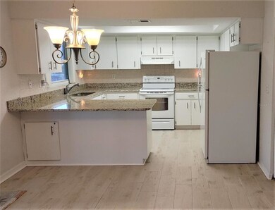 kitchen flows into dining area