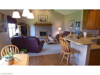Family Room with fireplace and vaulted ceilings.