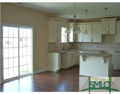 Kitchen. View of Breakfast area and Kitchen. Back 