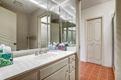 Bathroom with vanity and tile patterned floors