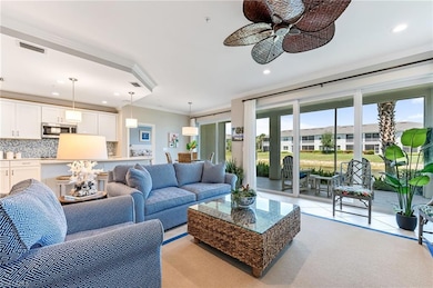 Living area featuring recessed lighting, visible v