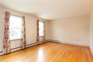 Bedroom with lovely hardwood floors.