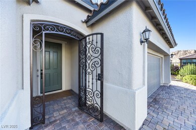 View of exterior entry featuring stucco siding, an