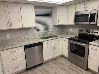 13240 White Marsh Ln unit 9, Fort Myers, FL 33912 - photo 2