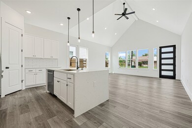 view of the kitchen open to the living room.