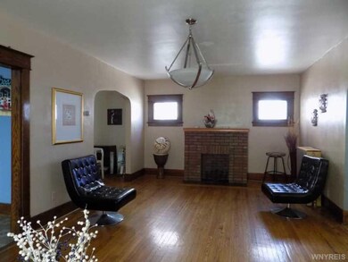 Living Room. Lovely hardwood floors throughout the