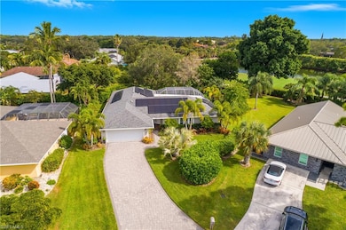 Large oversized lot with long pavered driveway