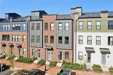 View of property featuring brick siding, entry ste