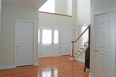 View of entry and showing guest closets