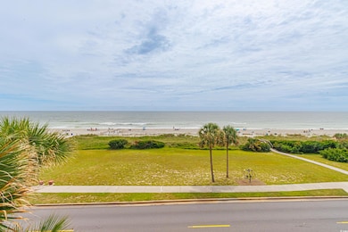 Property view of water featuring a beach view