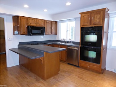 Kitchen includes double oven, dishwasher, microwav