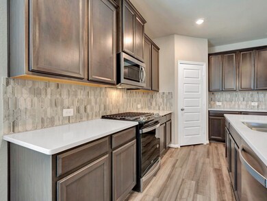 Photo is not of the actual home, but is an inspirational photo of builder’s model home and may depict options, furnishings, and/or decorator features that are not included