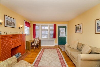 Spacious living room with access to front porch