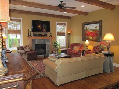 Wonderful hearth or family room open to kitchen. T