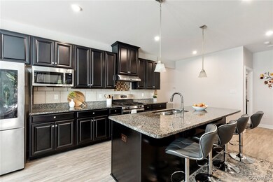 Large kitchen is a chef's dream! EVP flooring, rec
