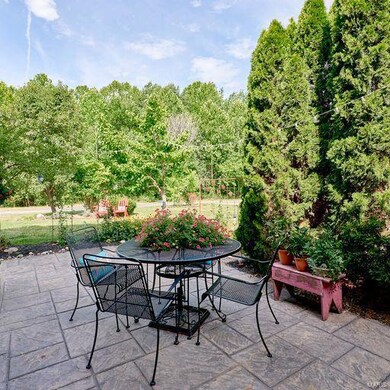 In back, you'll find a private Stamped Patio backi