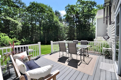 Spacious deck that overlooks the private serene ya