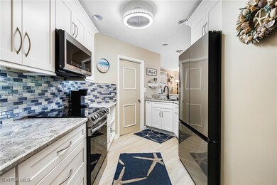Kitchen featuring appliances with stainless steel