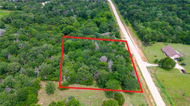Aerial view of sparsely populated area featuring a