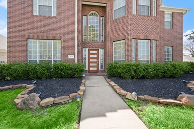 Updated front door adds eye catching curb appeal.