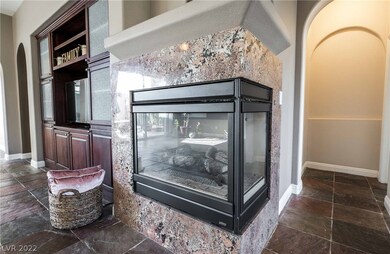 GRANITE SURROUNDED FIREPLACE
