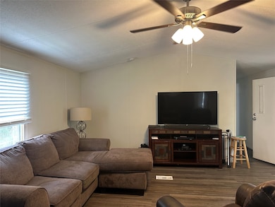 Living room open to the kitchen