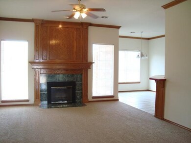 Living Room. Wood burning FP w/gas start, crown mo