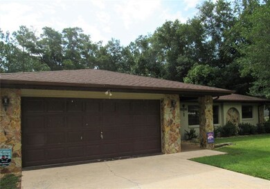 Spacious 2-Car Attached Garage w/ Stone Accent.